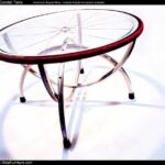 Table basse réalisée avec un une roue de vélo et de vieilles jantes par l'artiste et mécanicien américain Andy Gregg (Bike Furniture).